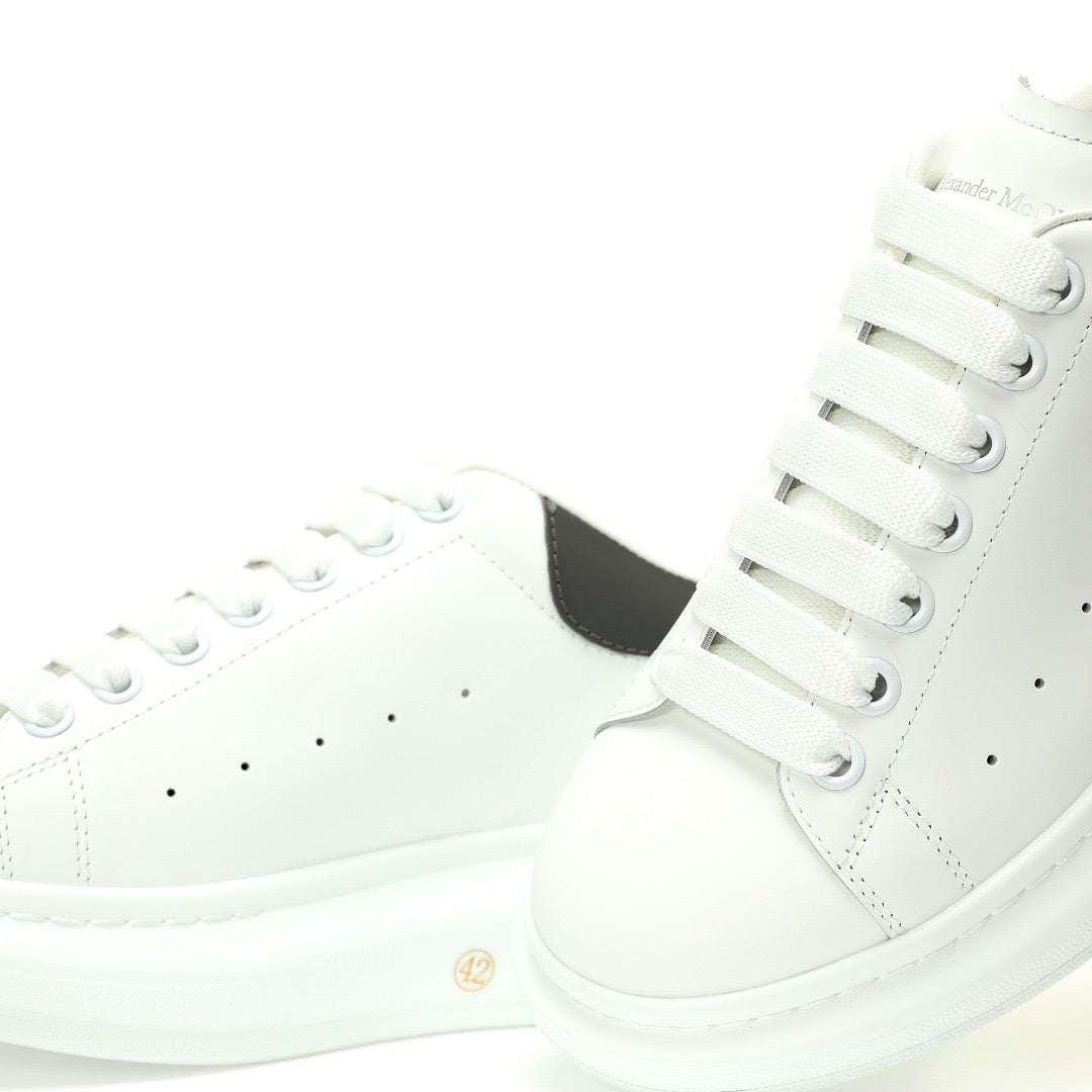 McQueen Black Logo